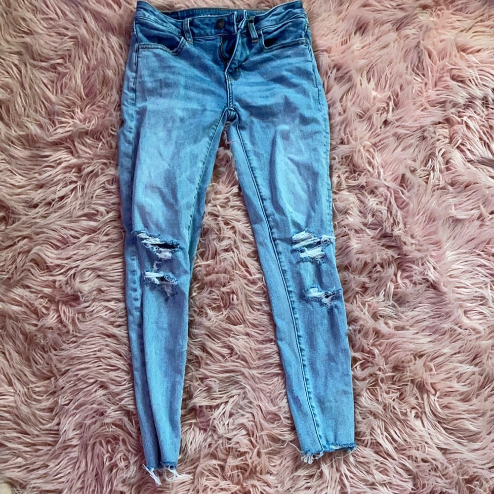 distressed blue jeans